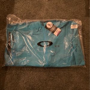 NIB OAKLRY TEAL / AQUA XXL WINDBREAKER GOLF JACKET XXL NIB
